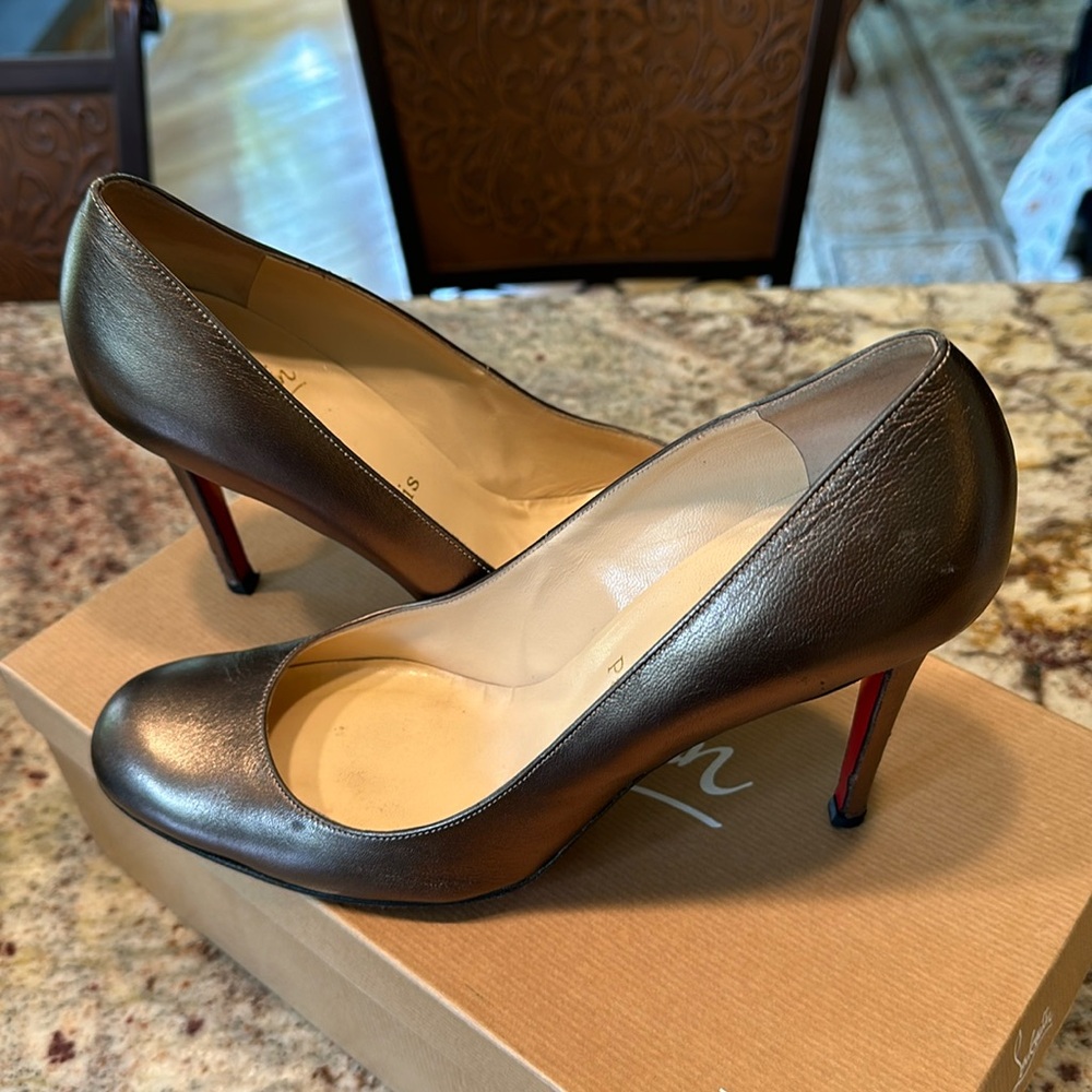 Christian Louboutin pumps. Round toe, Gold metallic. 4” heels